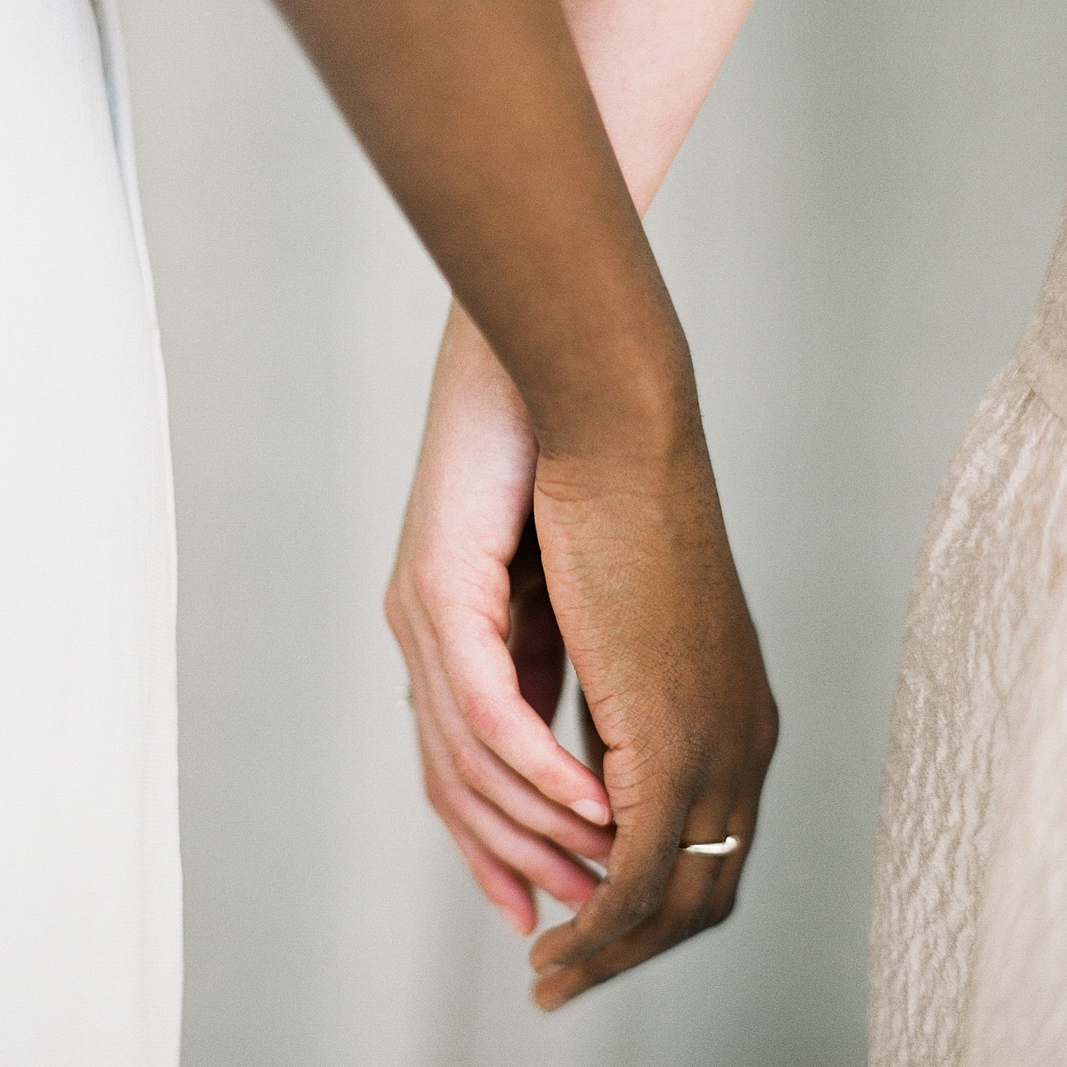 Holding hands in unity and affection.