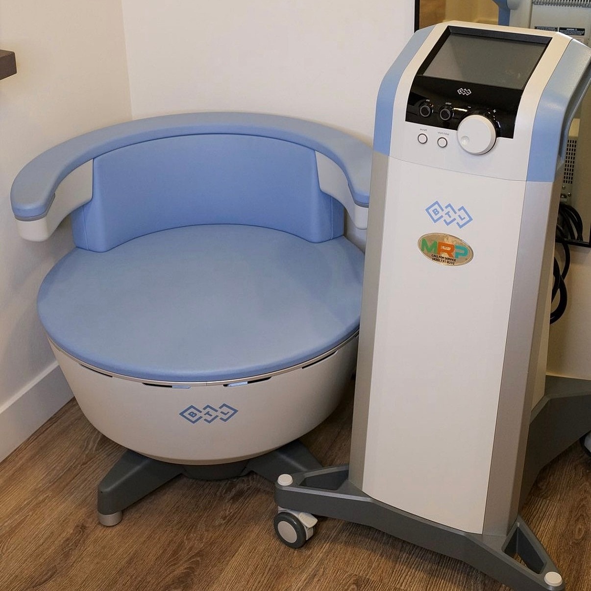 Medical equipment with a blue treatment chair.