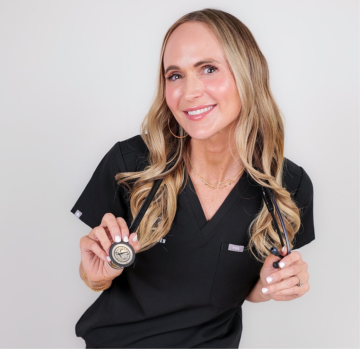 Syringes displayed creatively in a martini glass.