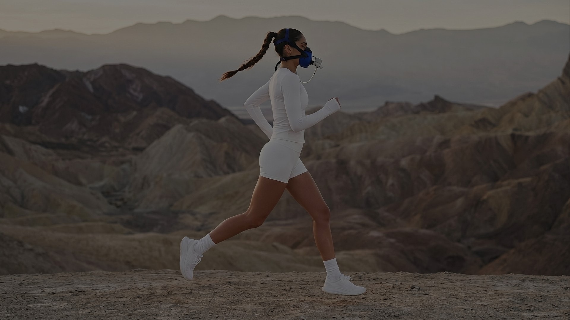 Woman running in white outfit with mask.
